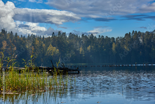 Fototapeta Naklejka Na Ścianę i Meble -  Old footbridge on the lake