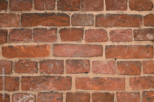 Red grunge brick wall, abstract background texture with old dirty and vintage style pattern.