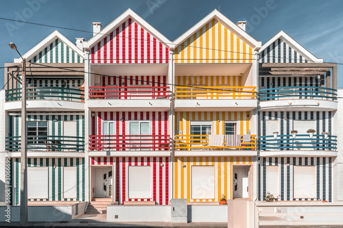 Bright striped beach houses in the Portuguese resort of Costa Nova