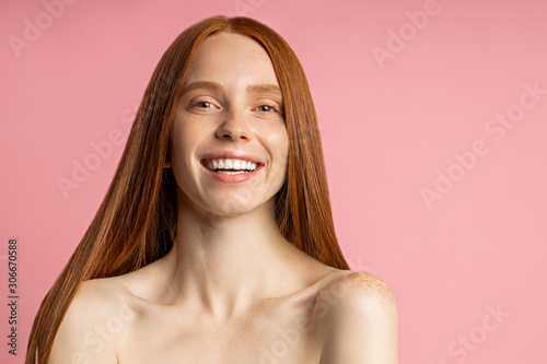 Beautiful spa woman with perfect fresh freckled skin