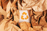 Reusable paper and cardboard for packing,Recycle sign, nature-friendly concept, eco-conscious life