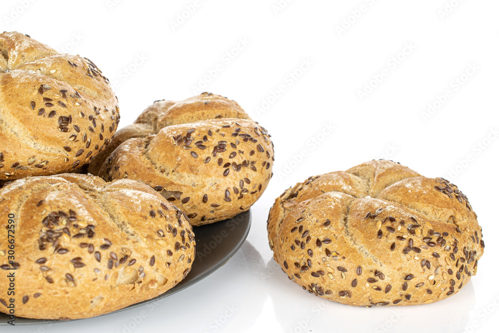 Group of four whole arranged sesame kaiser roll on gray ceramic plate isolated on white background Group of four whole arranged sesame kaiser roll on gray ceramic plate isolated on white background
