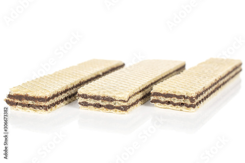 Group of three whole sweet chocolate biscuit wafer isolated on white background