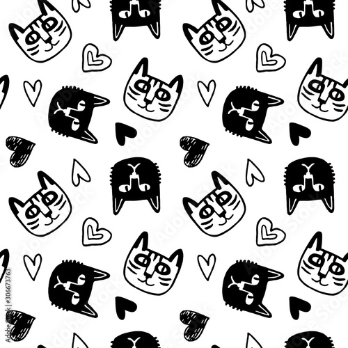 Seamless pattern with cute cats and hearts.