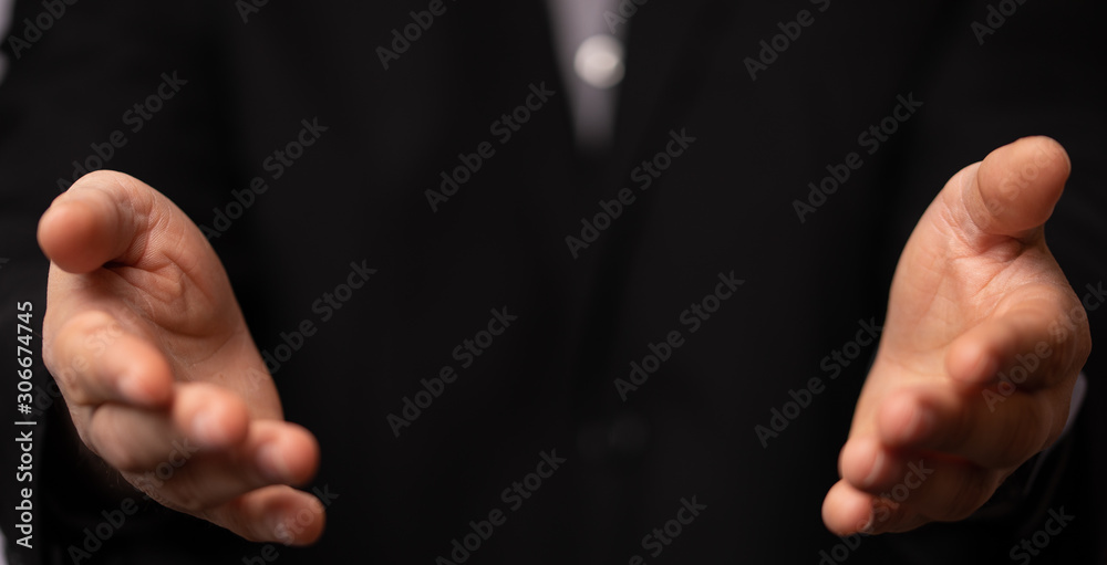 Businessman without head holding something without theme Businessman without head holding something without theme