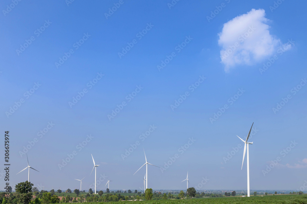 white wind turbines generating electricity in wind power station alternative renewable wind energy under blue sky white wind turbines generating electricity in wind power station alternative renewable wind energy under blue sky