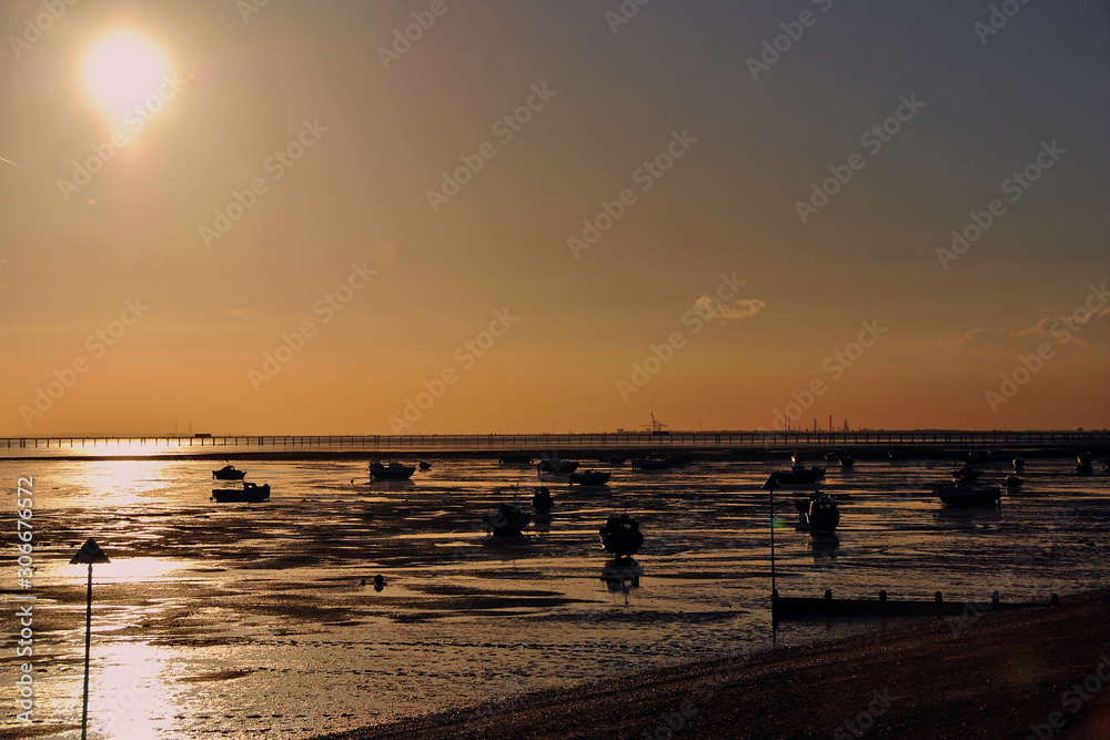 Sunset over the boats in Thorpe Bay, Southend on Sea, Essex, England, United Kingdom