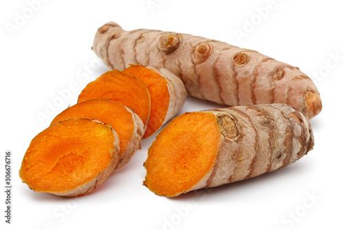 Fresh turmeric and slices isolated