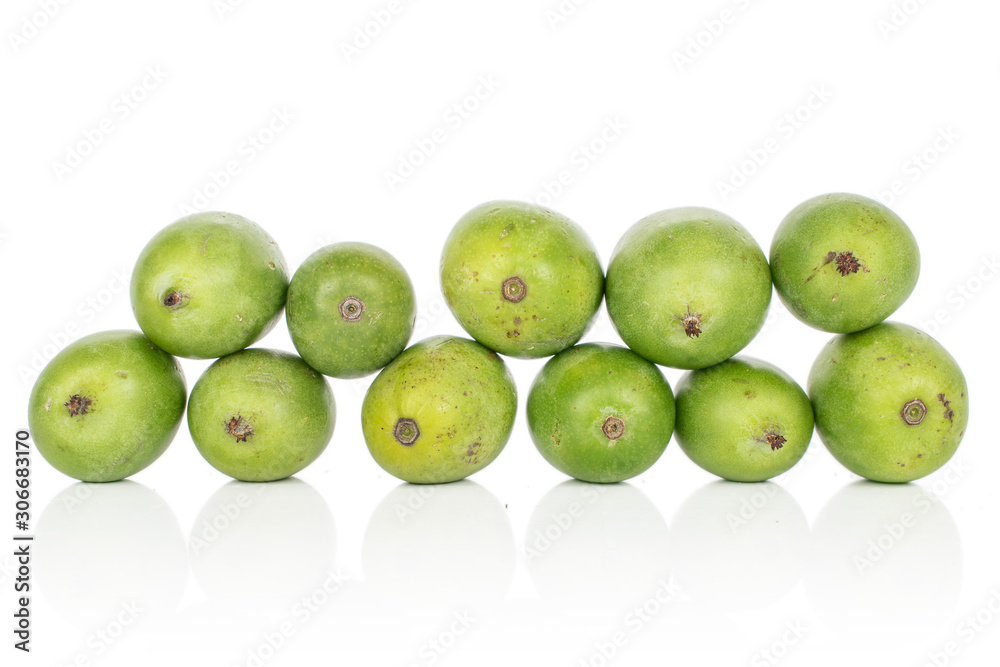Lot of whole hardy green kiwi fruits isolated on white background Lot of whole hardy green kiwi fruits isolated on white background