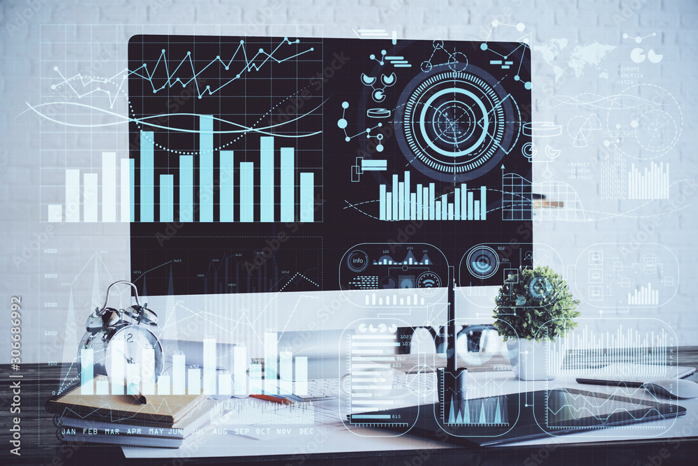Financial market graph hologram and personal computer on background. Double exposure. Concept of forex. Financial market graph hologram and personal computer on background. Double exposure. Concept of forex.