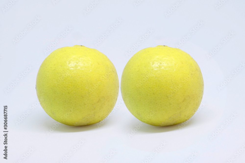 Two whole lemon isolated on white background Two whole lemon isolated on white background