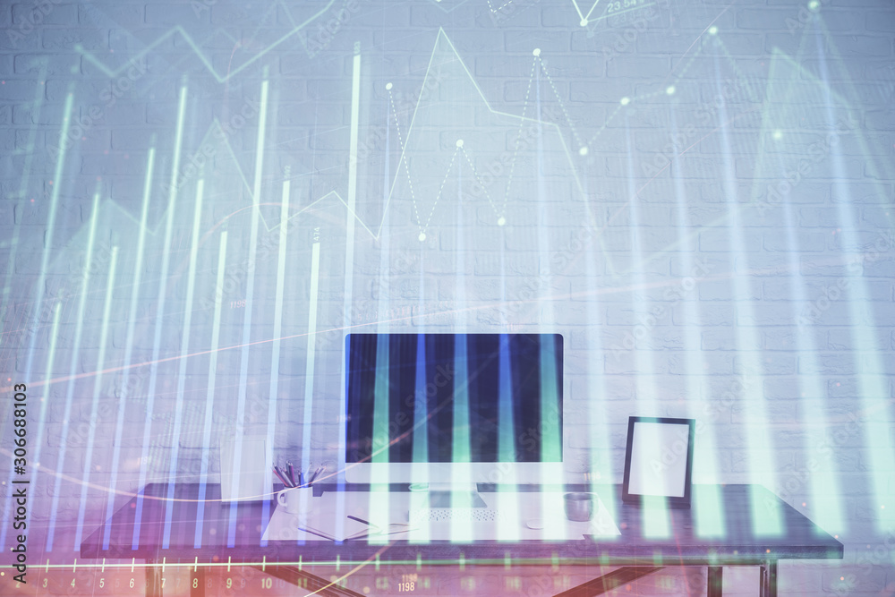 Forex Chart hologram on table with computer background. Double exposure. Concept of financial markets. Forex Chart hologram on table with computer background. Double exposure. Concept of financial markets.