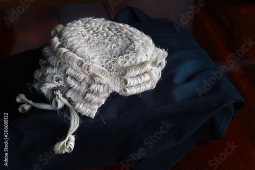 Barrister's wig and gown on table
