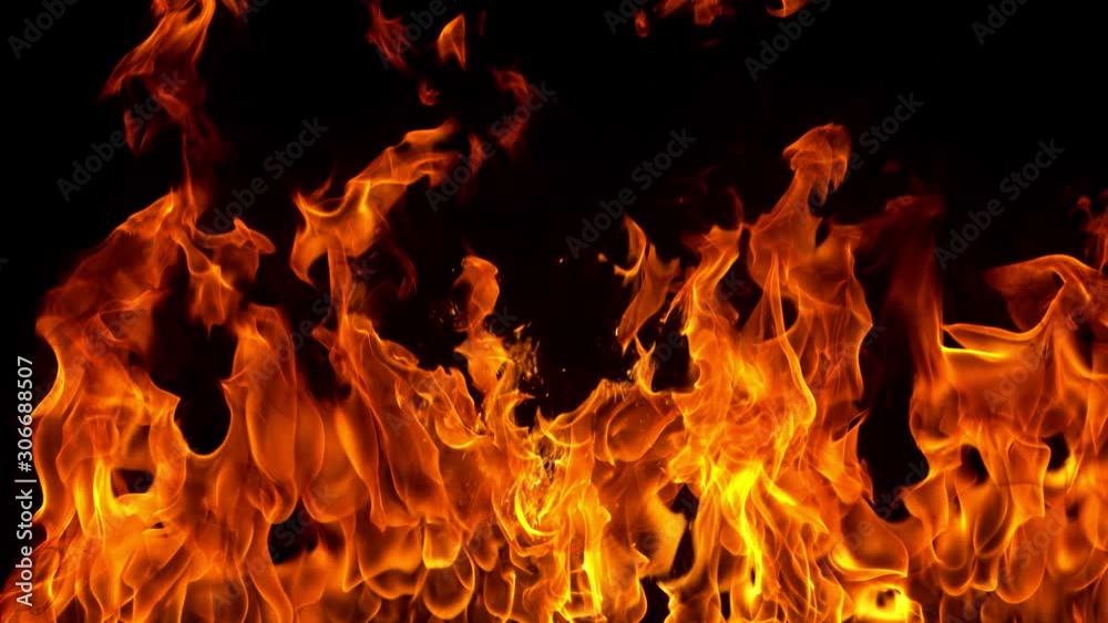 Super Slow Motion Shot of Fire Flames Isolated on Black Background at 1000fps. Shooted with High Speed Cinema Camera in 4K resolution