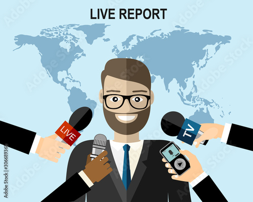 Business man giving an interview in the presence of journalists with microphones.