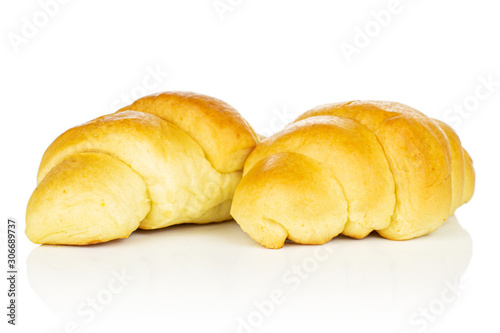 Group of two whole sweet golden mini croissant isolated on white background