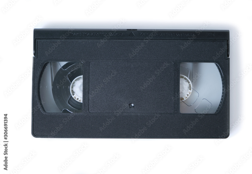 Retro videotape on white background, close-up isolate.