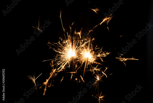 Firework sparkler burning isolated black background  shining fire flame  celebration festival happy holiday new year and merry christmas concept.