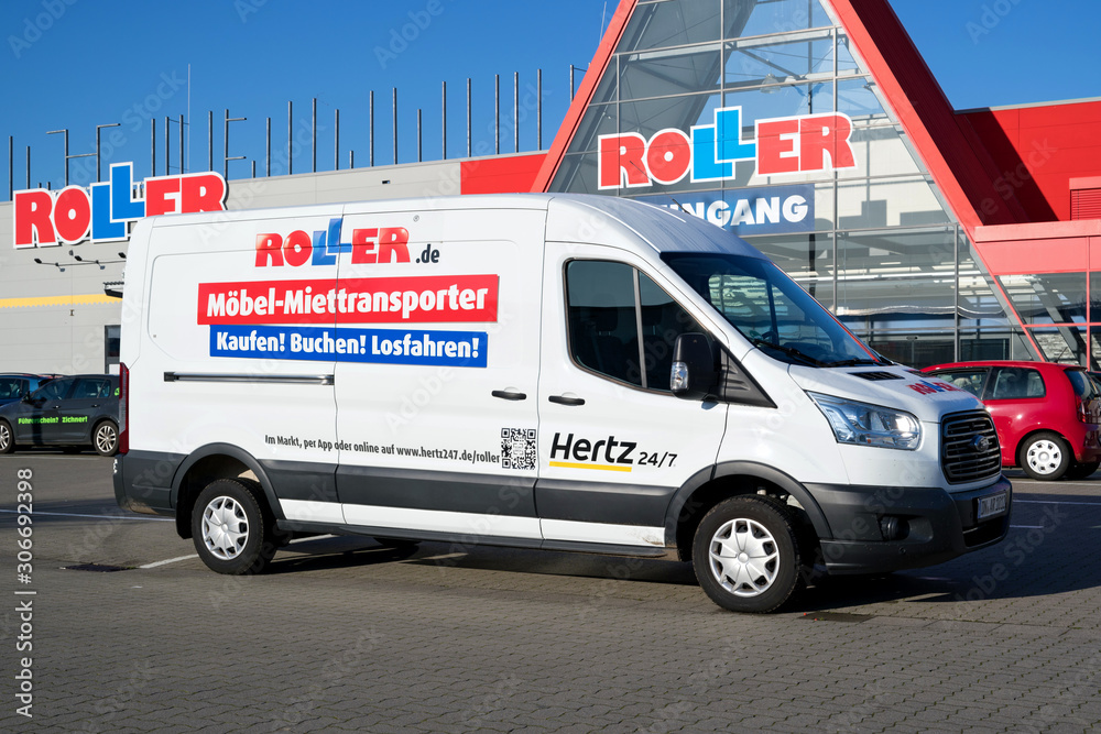 CUXHAVEN, GERMANY - OCTOBER 29, 2019: Hertz 24/7 Roller rental van at  store. Roller is a German furniture discounter based in Gelsenkirchen.  Stock Photo | Adobe Stock