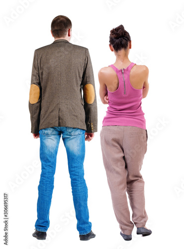 Back view of couple. beautiful friendly girl and guy together.