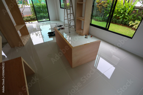 Photo interior home office renovation, furniture built in with plywood material instal