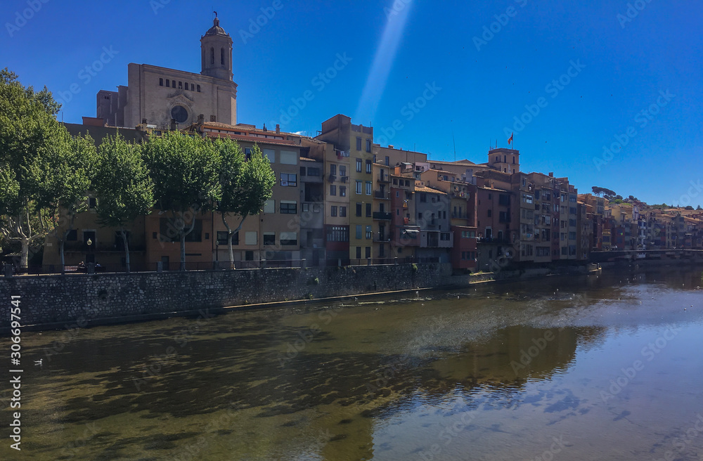 Buildings in residential district in Girona over the Onyar river  