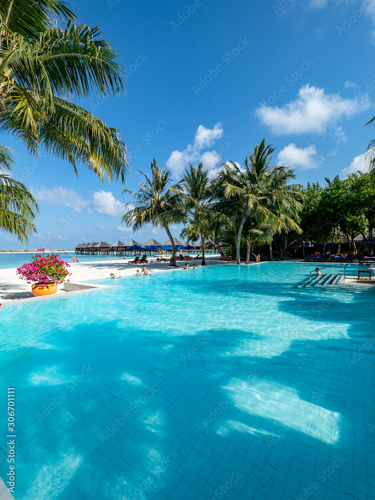 Maldives island with pool and water bungalows, South Male Atoll, Maldives