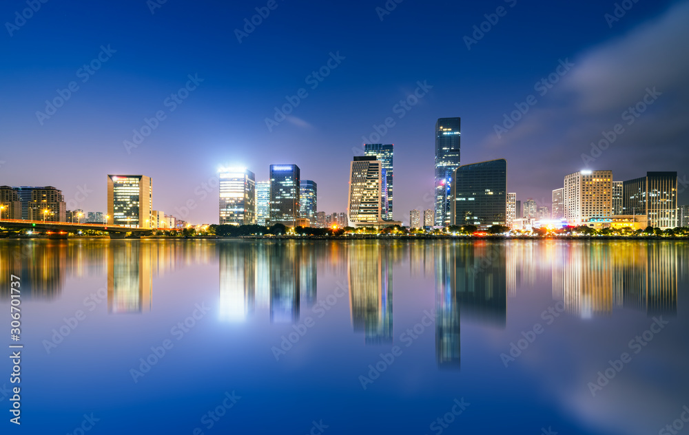 Night view of modern office building in Fuzhou Financial District.. Night view of modern office building in Fuzhou Financial District..