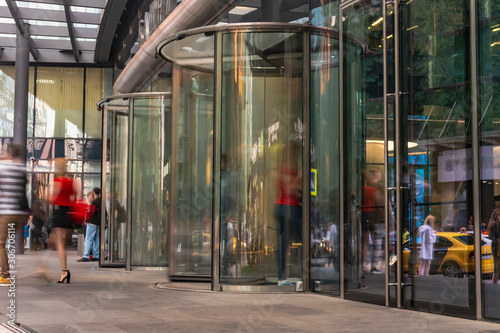 Photography The movement of people at the entrance to modern building