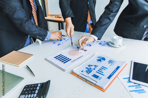 фотографія Businessmen in the meeting room are introducing and consulting each other in order to make good business profits