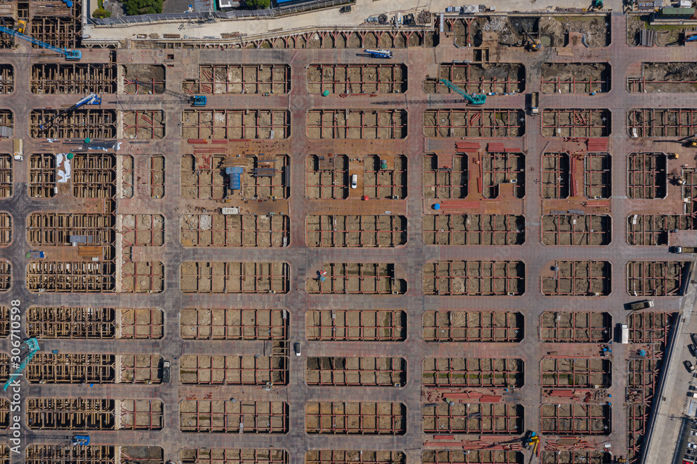 Aerial view of a steel structure construction site Building ultra-tall buildings That requires the expertise and expertise of a team of technicians and engineers to make the building that is built is Aerial view of a steel structure construction site Building ultra-tall buildings That requires the expertise and expertise of a team of technicians and engineers to make the building that is built is
