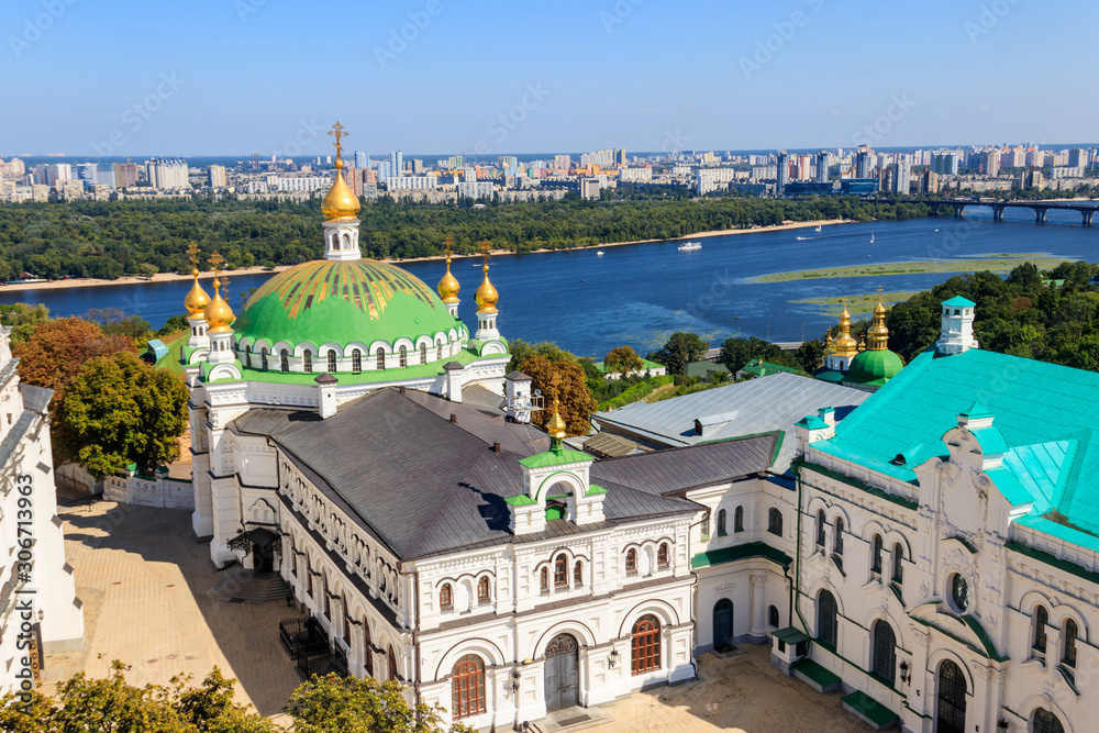 View of the refectory church of Kiev Pechersk Lavra (Kiev Monastery of the Caves) and the Dnieper river in Ukraine. View from Great Lavra Bell Tower