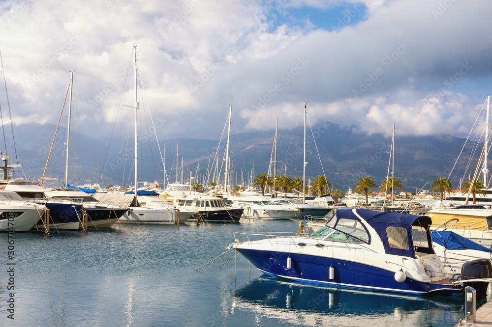 Marina. Montenegro, Adriatic Sea, Bay of Kotor, Tivat city. View of yacht marina of Porto Montenegro in winter Marina. Montenegro, Adriatic Sea, Bay of Kotor, Tivat city. View of yacht marina of Porto Montenegro in winter