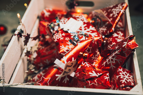 Beautiful advent calendar closeup with bright red colors and a nice decoration for christmas -  Anticipation is the greatest joy