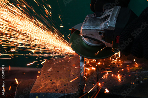 work as a grinder, metal cutting, sparks from metal cutting