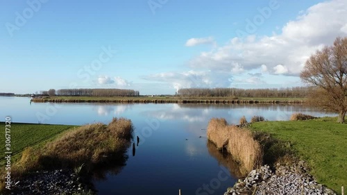 Aerial drone footage of the tidal river Het Spui in Holland  with calm and clear weather. photo