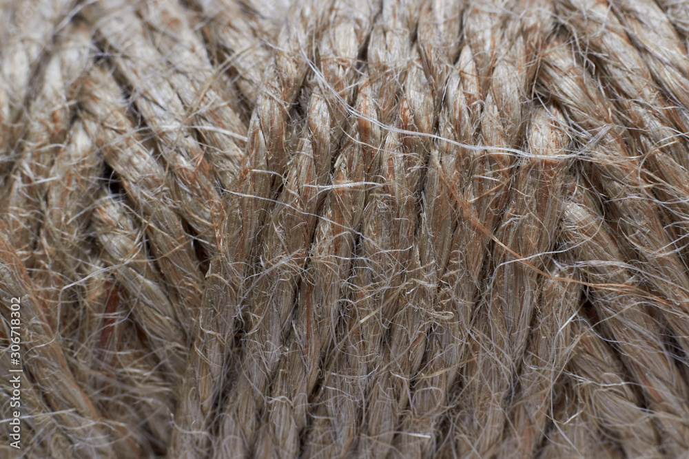 Fototapeta premium Photo bobbins with thread, rope close-up for texture or background.