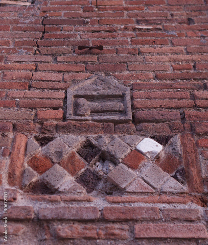 Slika na platnu Talisman in the form of a phallus in the wall of the house of Pompeii (Pompei)