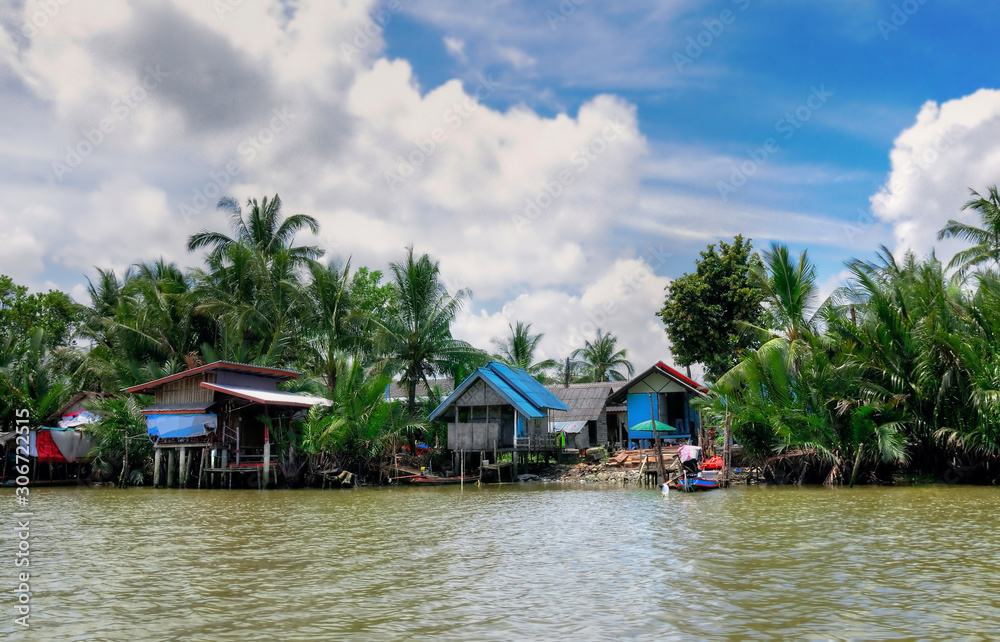 Waterfront houses of small fishing boats In the south of Thailand