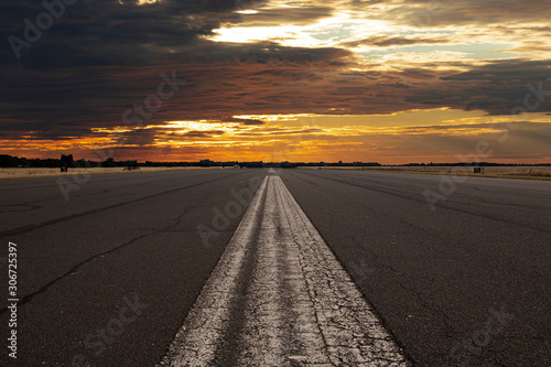 Runway in sunset. Edited photo.