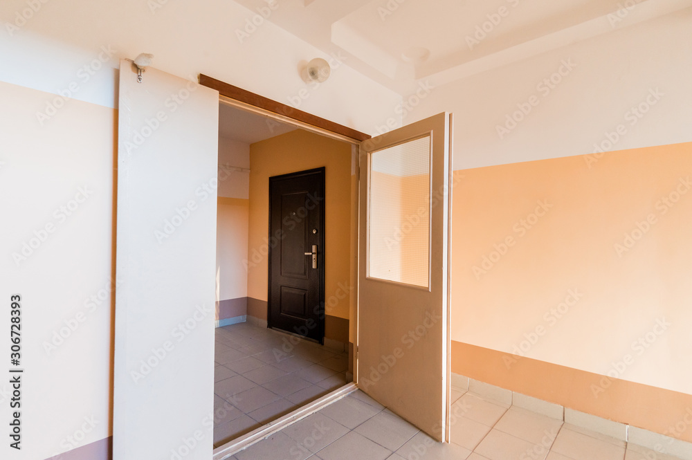 Russia, Moscow- July 25, 2019: interior room apartment. standard repair decoration in hostel. room doors, repair corridor