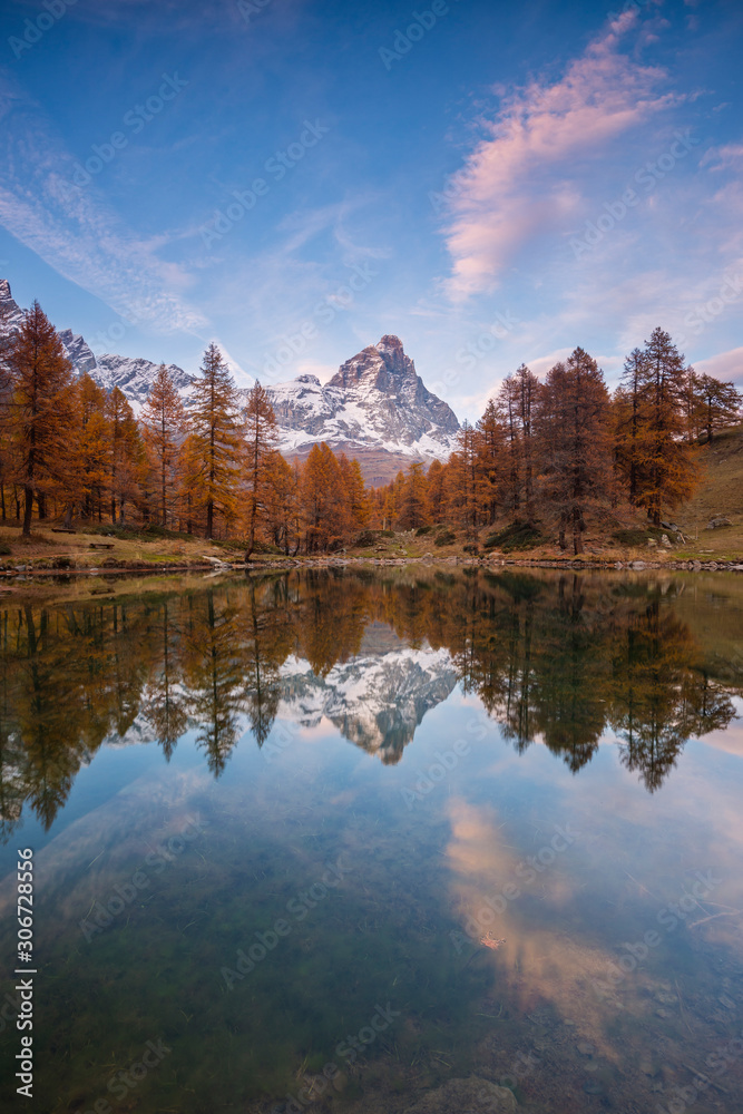 landscape with the Matterhorn peak reflected in the Blue Lake, Breuil-Cervinia, Aosta, Italy