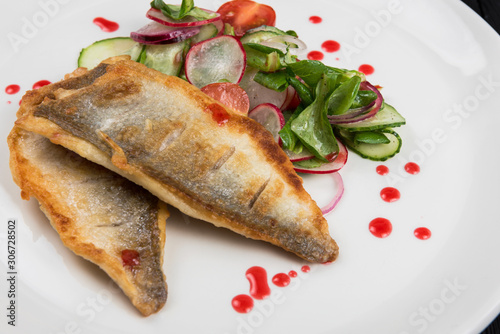 Fillet of fish with vegetab...