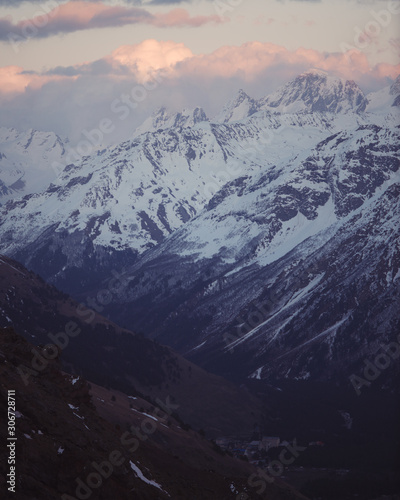 Snowy mountain peaks beautiful landscape at sunset