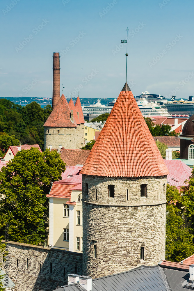 Old buildings at the Old Town, harbor and downtown in Tallinn, Estonia, viewed from above on a sunny day in the summe