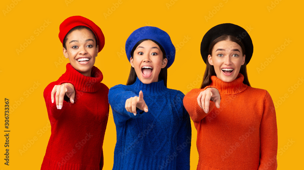 Smiling Diverse Girls Pointing Fingers At Camera, Yellow Background, Panorama Smiling Diverse Girls Pointing Fingers At Camera, Yellow Background, Panorama