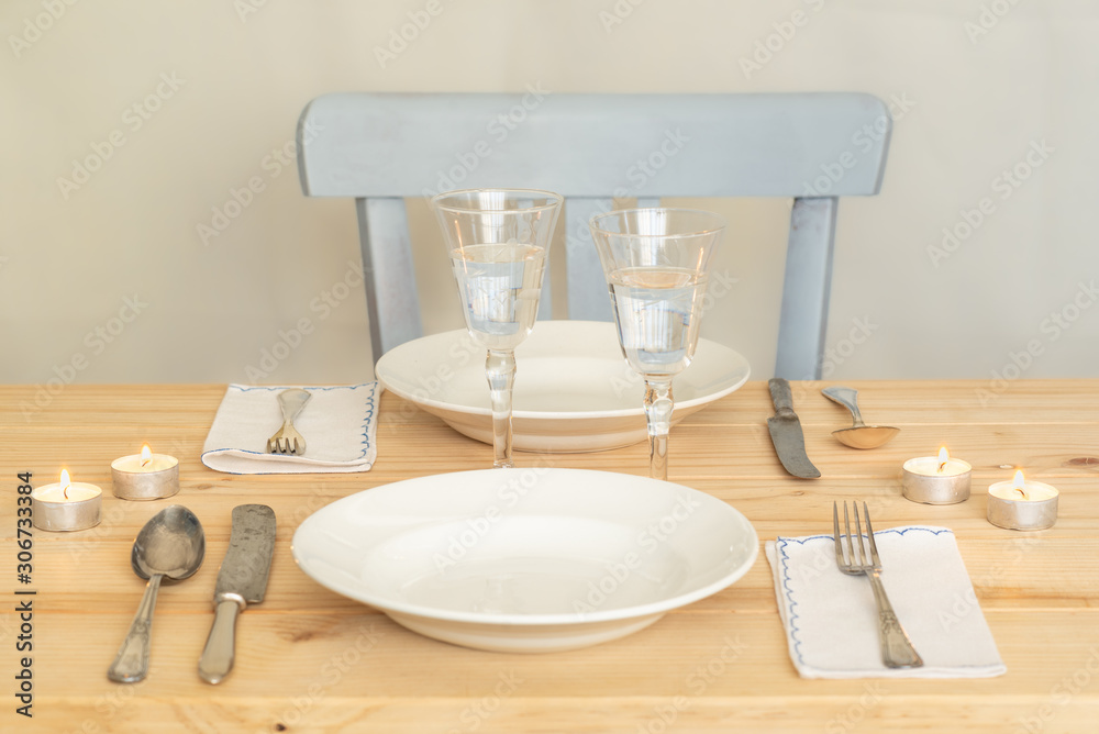 Scandinavian style table setting with neutral and natural colors. Scandinavian style table setting with neutral and natural colors.