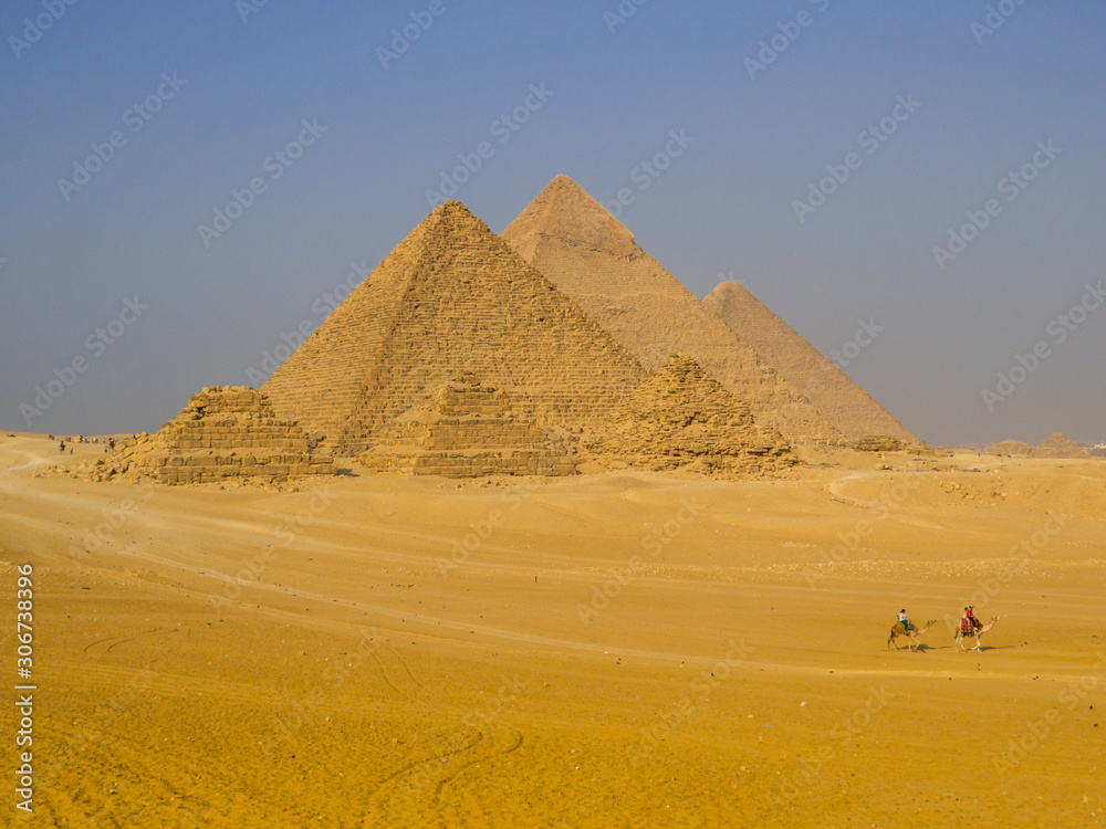 Cairo, Egypt - November 1, 2019: View of the Pyramids of Giza. Cairo, Egypt - November 1, 2019: View of the Pyramids of Giza.