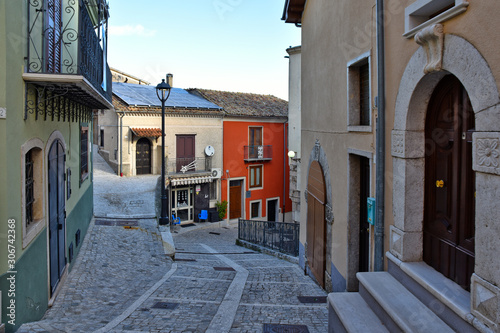 Fototapeta Naklejka Na Ścianę i Meble -  Cassano Irpino, Italy, 12/01/2017. A street among the colorful houses of a medieval village