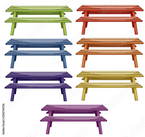 Isolated set of picnic tables in many colors